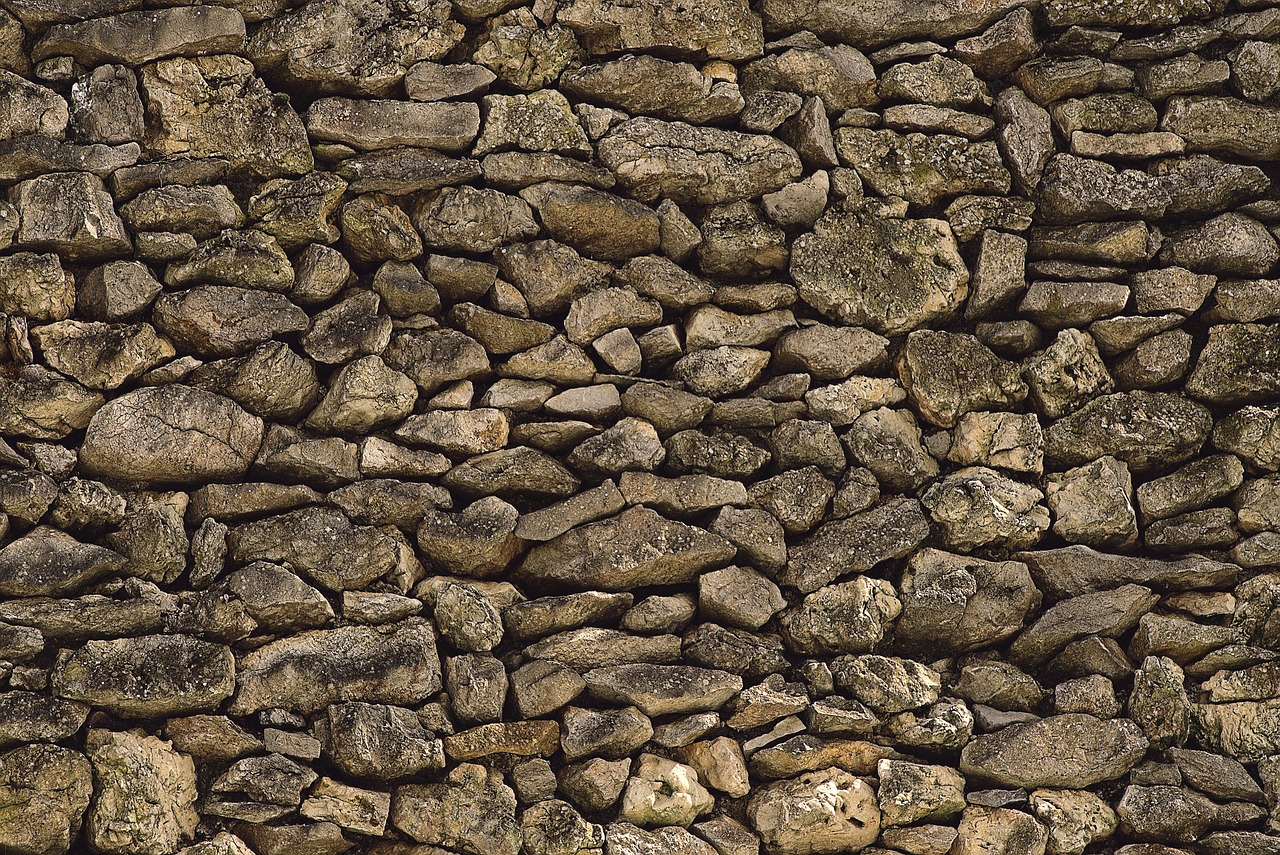 Stone wall, mac wallpaper, drywall in Riverside, CA